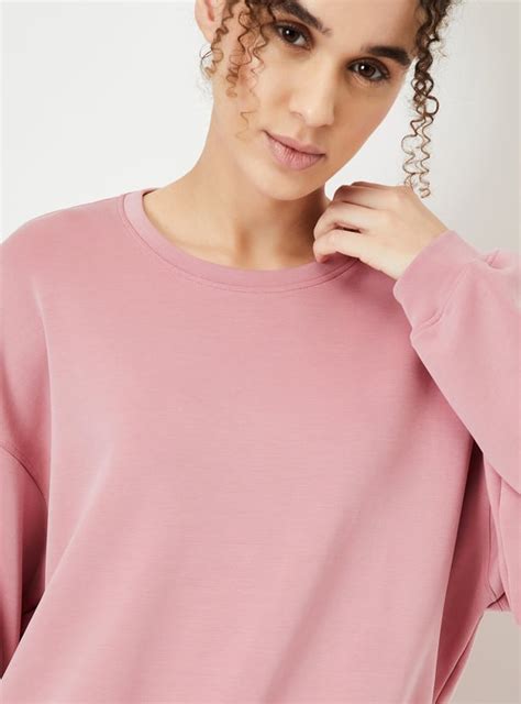 Buy Women Boxy Fit Solid Sweatshirt Online at just Rs. 999.0 ...