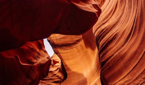 Download wallpaper 1024x600 cave, rocks, stone, sandstone, brown ...