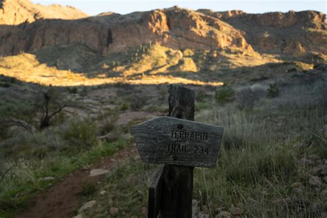 Close-up of a Wooden Sign with a Direction to a Hiking Trail in ...