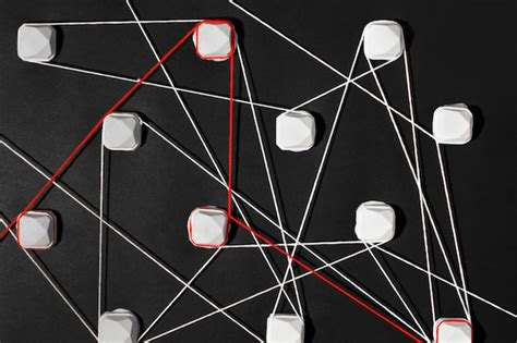 Still life of red thread connection | Free Photo