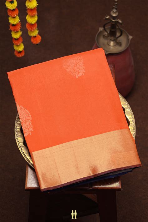 Soft Silk Saree In Bright Orange With Zari Motifs