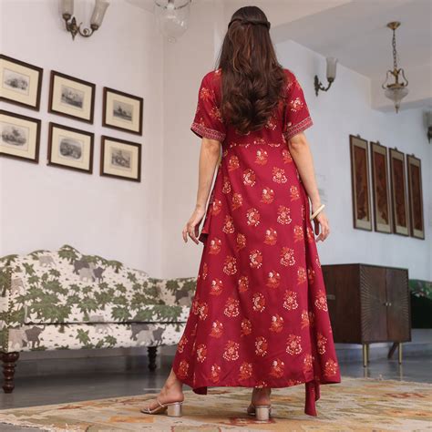 Buy Maroon Printed Flared Dress with Asymmetrical Hem | Rustorange