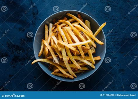 StockPhoto Crunchy Deep Fried Fries Adding Freshness And Texture To Any ...