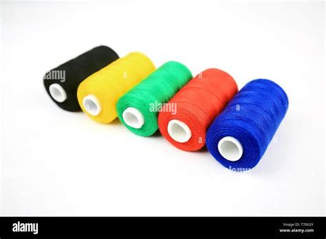 sewing thread in different colors Stock Photo - Alamy