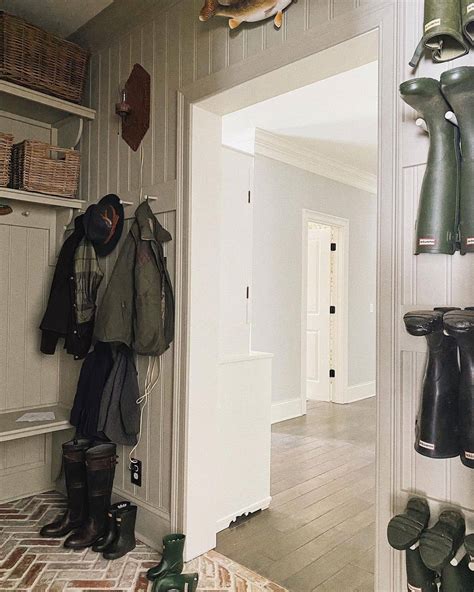 Rustic Farmhouse Mudroom With Brick Herringbone Flooring - Soul & Lane