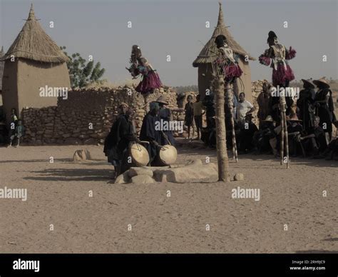 Dogons traditional dance. masked african people dance a traditional ...
