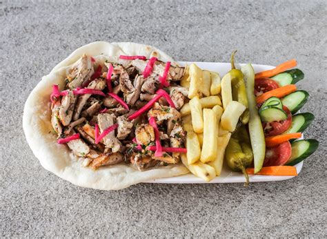 Premium Photo | Chicken shawarma platter with french fries and salad ...