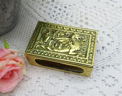 Vintage brass matchbox holder featuring a dragon or wyvern / Wessex ...