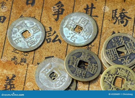 Ancient Chinese Coins on a Text Back Stock Image - Image of antique ...