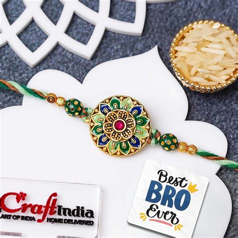 eCraftIndia Multicolor Flower Designer Rakhi for Brother With Gift ...