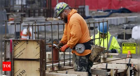 US weekly jobless claims unexpectedly fall - Times of India