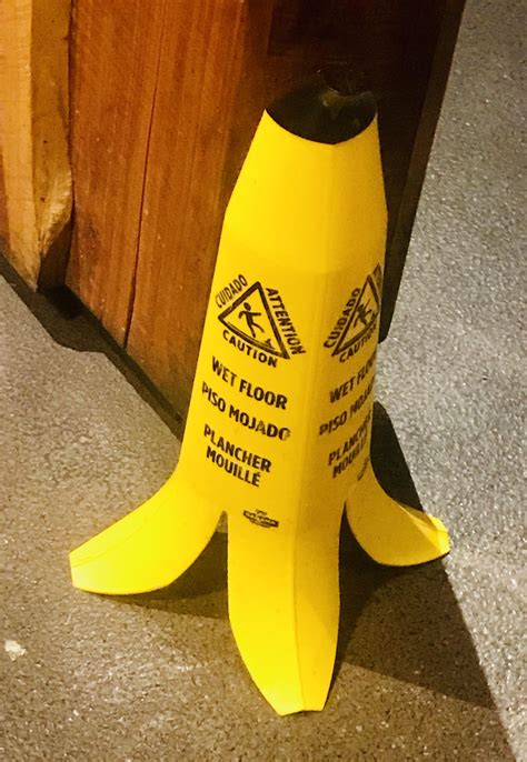 This wet floor sign shaped like a banana peel : r/bananawetfloorsign