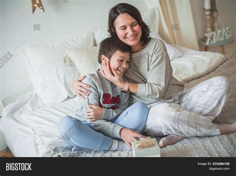 Mom son share bed