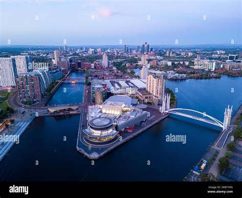 Aerial view of The Lowry Centre at Salford Quays with Manchester in ...