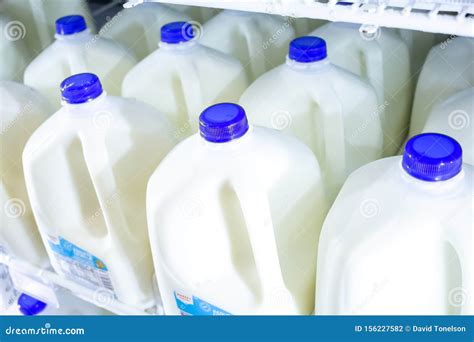 Several Gallon Jugs of Milk at the Store Editorial Photography - Image ...