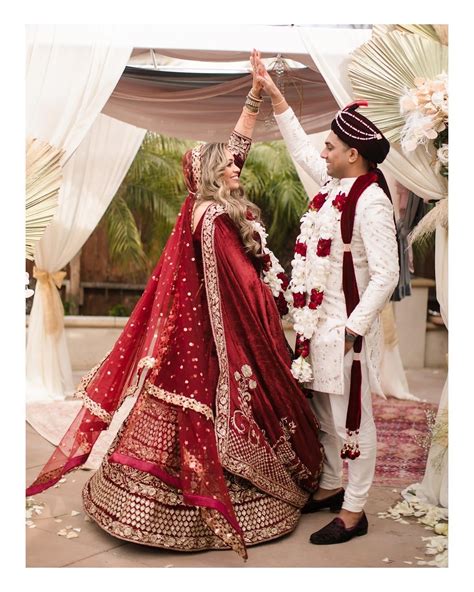 Maroon velvet lehenga and white sherwani – Ricco India