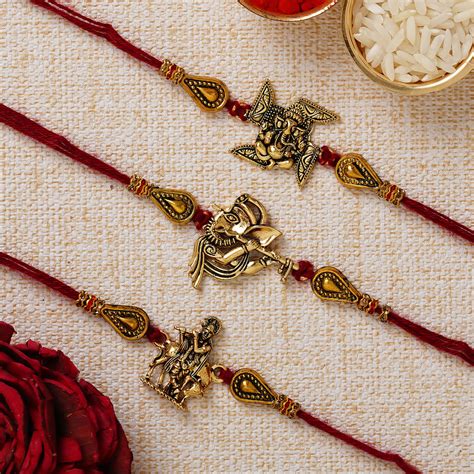 Red & Golden Pack of 3 Religious Rakhis and Roli Chawal Pack ...