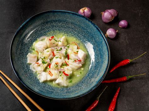 Download Ceviche Fish Meat In Lime Sauce Wallpaper | Wallpapers.com