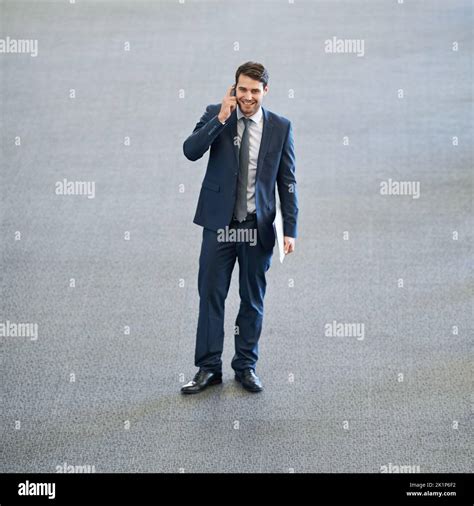 Taking success in his stride. Full length shot of a young businessman ...