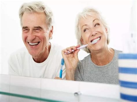 Brushing teeth at THIS time of day is linked to a longer life, says ...