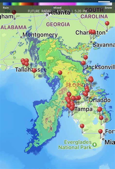 A storm system, passing over Florida, is now similar in size and shape to the state of Florida ...