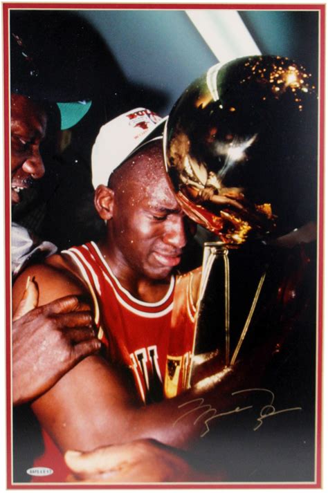 Lot - Michael Jordan Signed Photo: Crying with Trophy, 1st NBA Championship