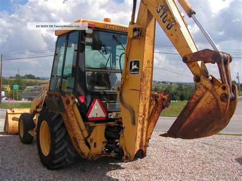 John Deere 310 D Backhoe