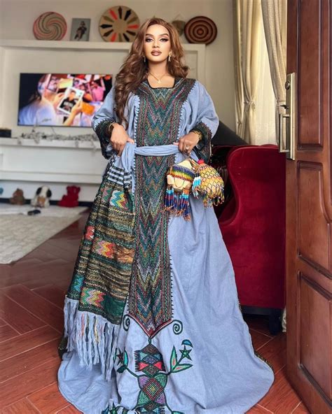 Unveiling the Azure Elegance of Habesha Dress in the Radiant Blue Raya ...