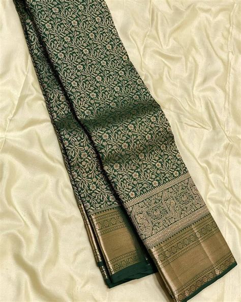 Eloquence Dark Green Soft Banarasi Silk Saree With Engrossing Blouse P ...