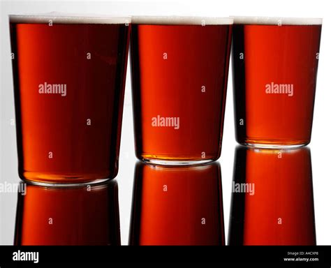 THREE PINTS OF ALE Stock Photo - Alamy