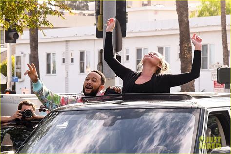 Chrissy Teigen & John Legend Hang Out of Their Car to Celebrate Biden