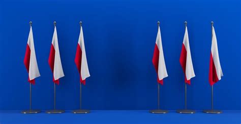 A set of flags with the polish flag on a blue background. | Premium Photo