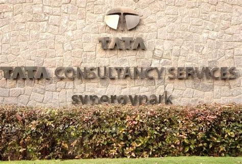 TCS shares trade lower after it announces to layoff 12,200 employees ...