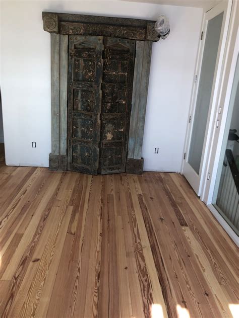 Sand and Finish Heart Pine flooring in Historic St. Augustine
