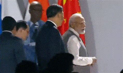 PM Modi raises border concerns with China's Xi in brief chat at BRICS ...
