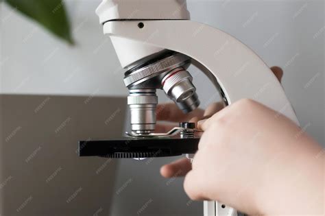 Image result for A Person Inspecting Using Microscope