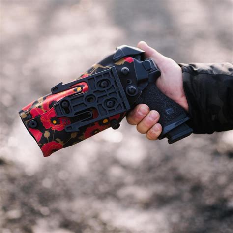 SAFARILAND TEAMS UP WITH OTTE GEAR IN ALOHA POW POPPIES OF WAR HOLSTERS