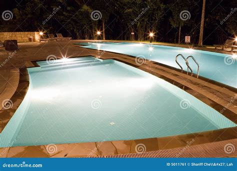 Swimming Pools at Night stock image. Image of pool, aqua - 5011761