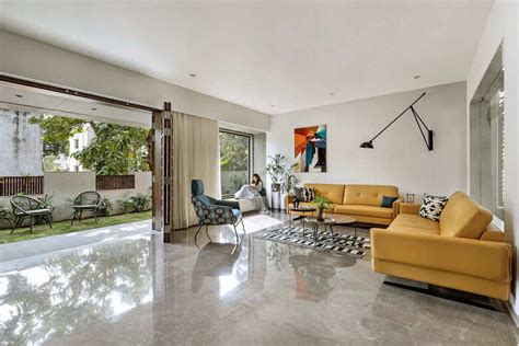 An open central courtyard binds all three floors of this family home ...