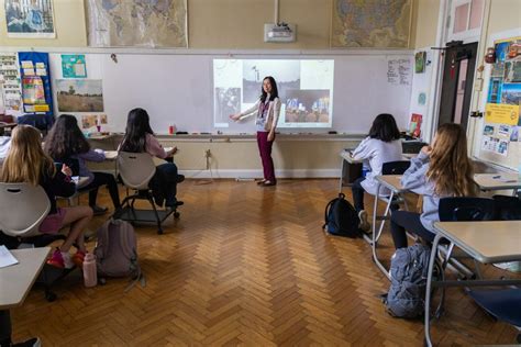 Sixth Graders Get Stamps on their World Language Passports - MICDS