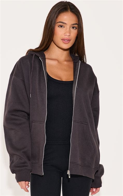 https://cdn-img.prettylittlething.com/0/a/a/9/0aa9ae808a37e315e0250da522b42f7a483a9306_CNL7553_1_charcoal_oversized_zip_up_plain_front_hoodie.jpg?imwidth=2048