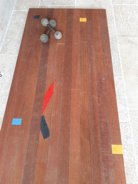 Old wooden gym floor with stripes - Piet Jonker