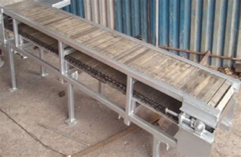 Chain Conveyors - Slat Chain Conveyor Manufacturer from Ghaziabad