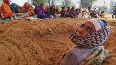 21 Farmers Bury Themselves Neck-Deep In Ground To Protest Against Land ...