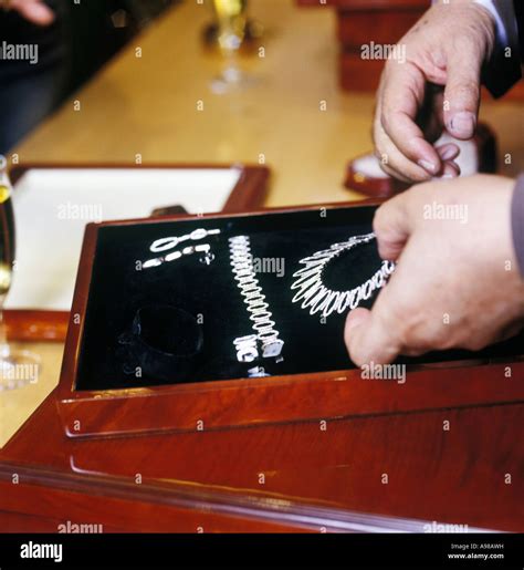 expensive silver jewellery in a jewellers shop Stock Photo - Alamy