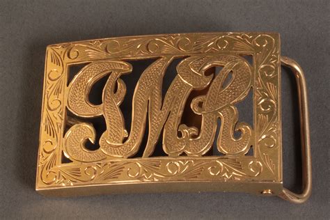 Lot 253: 14K Belt Buckle, monogrammed JMR | Case Antiques