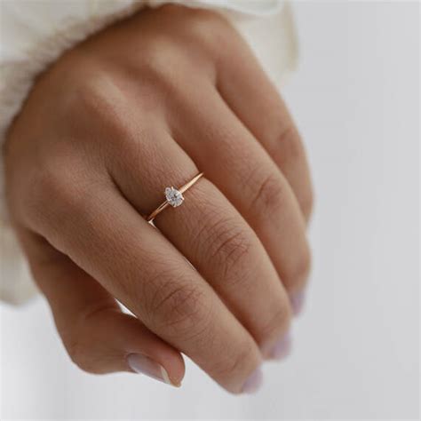 Janet 0.30 CT Pear Cut Diamond Rose Gold Solitaire Ring