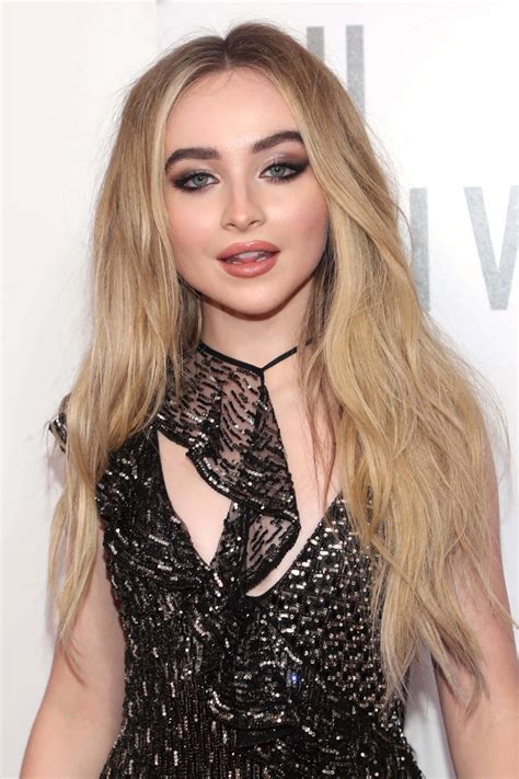 Download Sabrina Carpenter Black Sequin Dress Wallpaper | Wallpapers.com