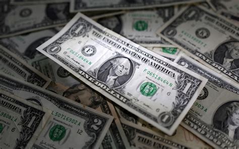 US dollar perks up as traders reduce bets on larger Fed rate cut | Reuters
