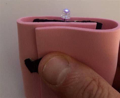 Image result for Keychain Squeeze Flashlight